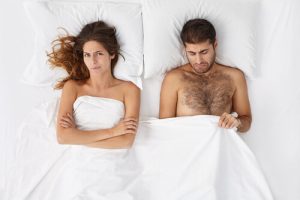 couple with sex problems in bed