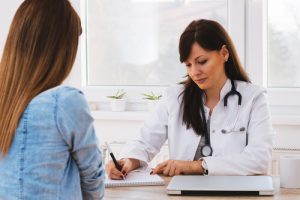 woman at the appointment with doctor